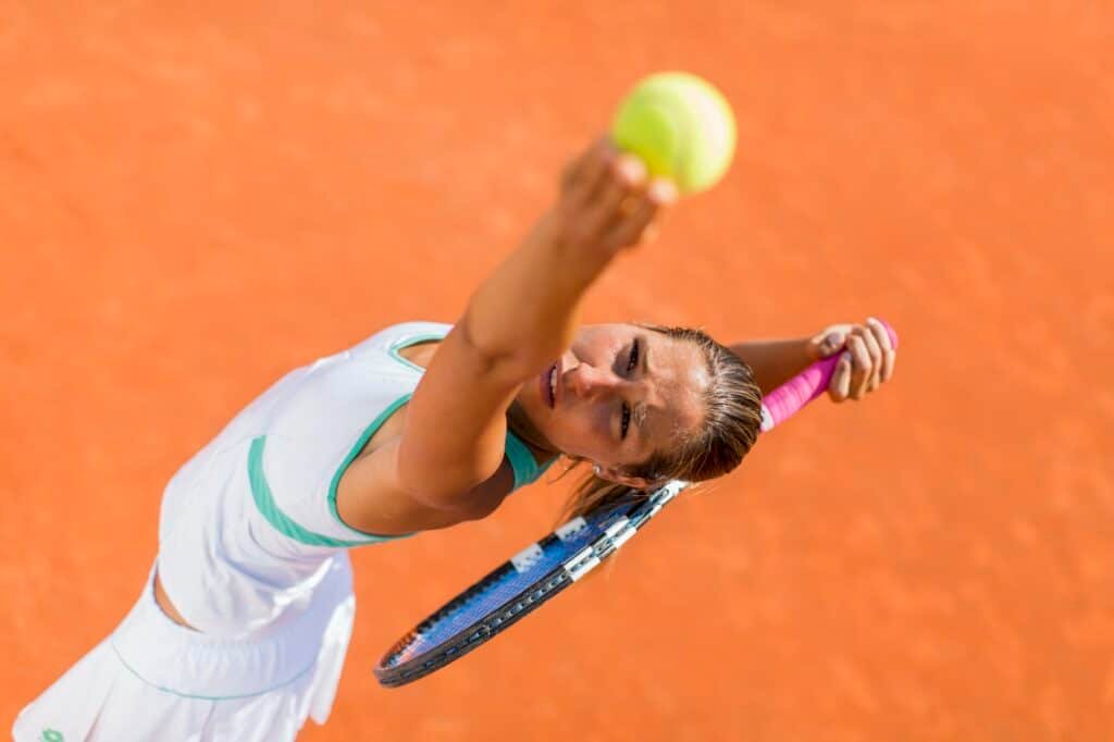 Young woman playing tennis