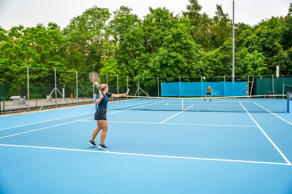 Professional tennis players playing the tennis on outside court