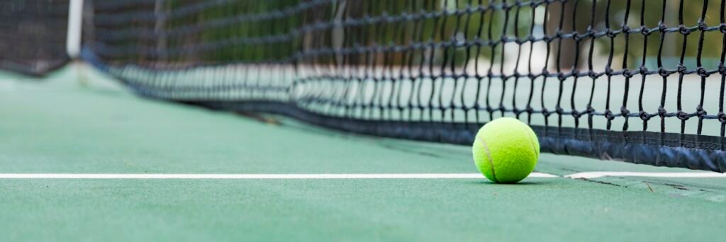 Tennis ball on tennis court