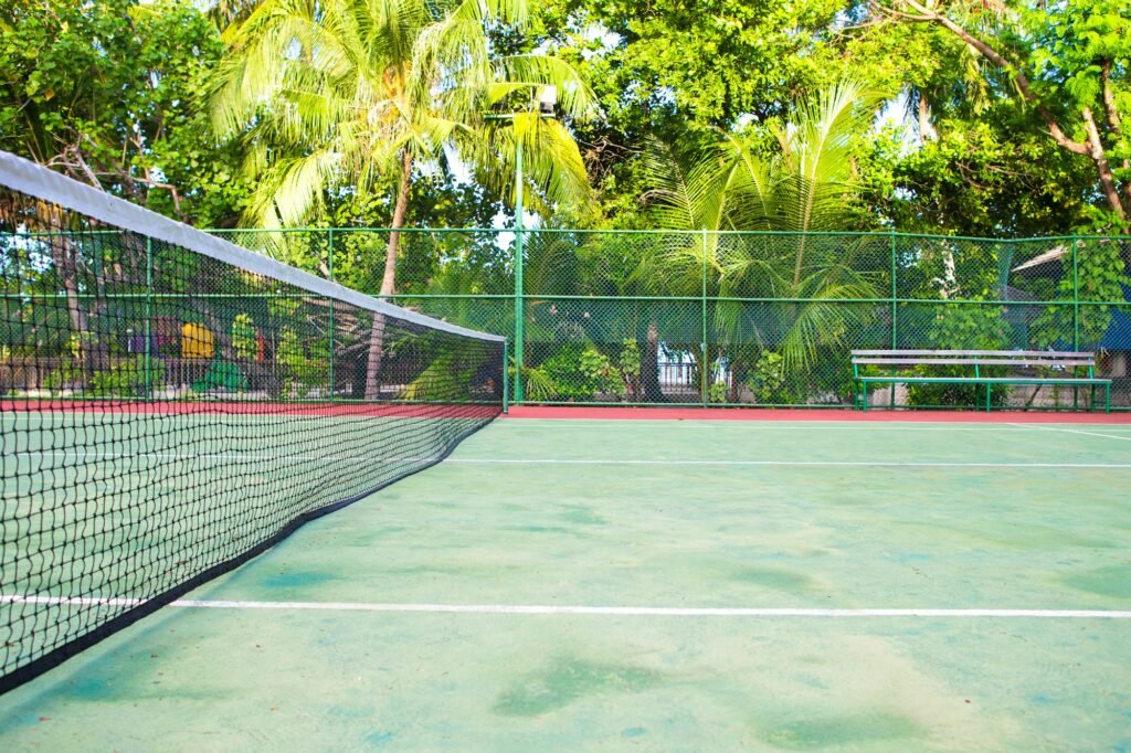 Tennis court on exotic tropical island - sport background